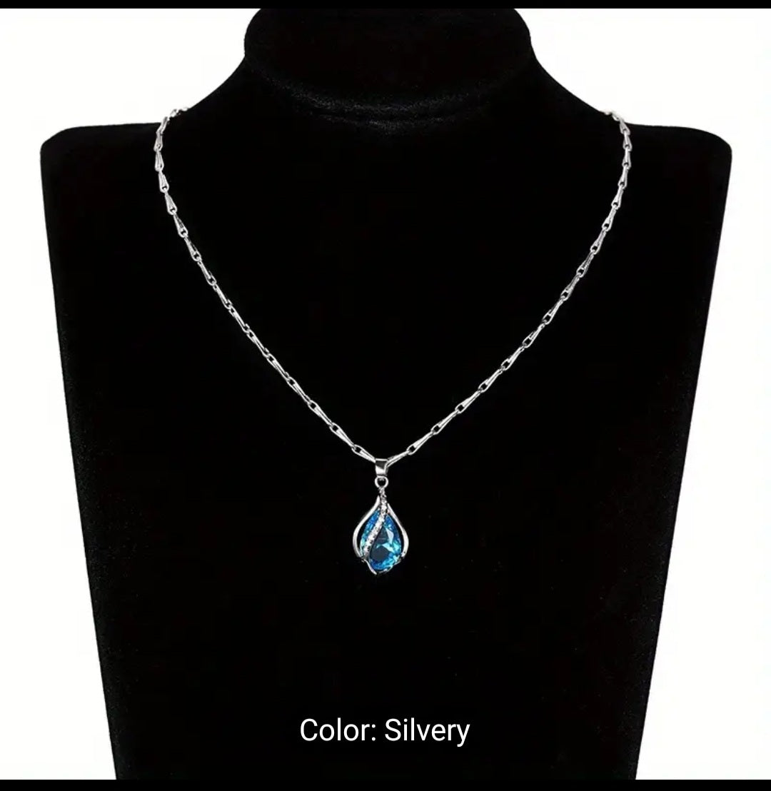 Captivating teardrop cut aquamarine gemstone. This 925-sterling silver piece is delicately balanced between luxury and simplicity. The perfect gift for that special person or special occasion. Treat yourself to something tasteful! l