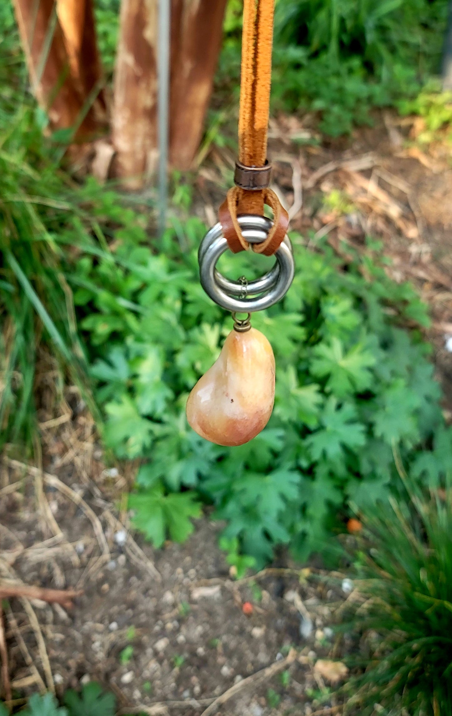 THIS BRASH AND BOLD AVENTURINE PENDANT IS LARGER THAN LIFE.