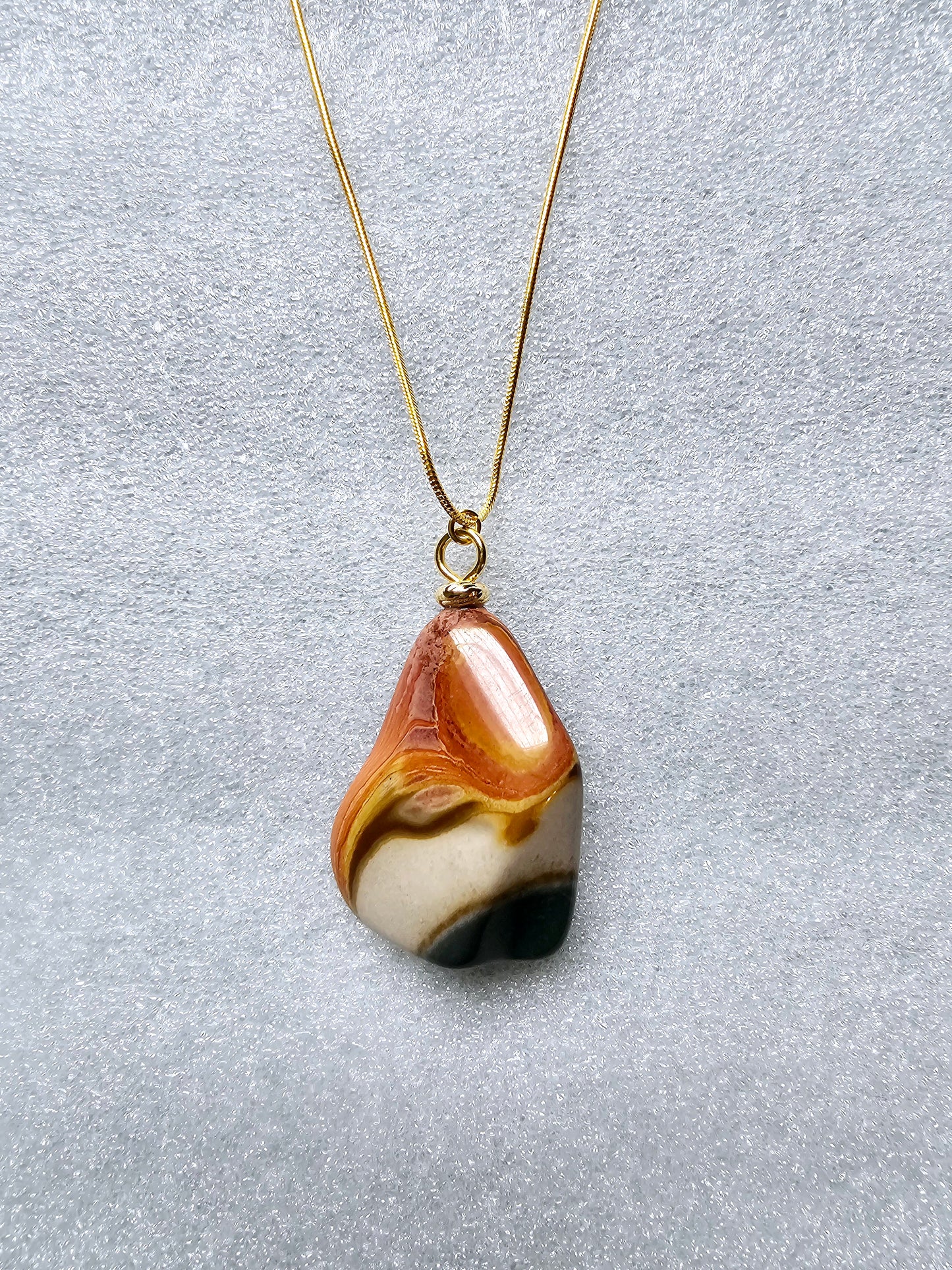 A STUNNING DESERT JASPER PENDANT