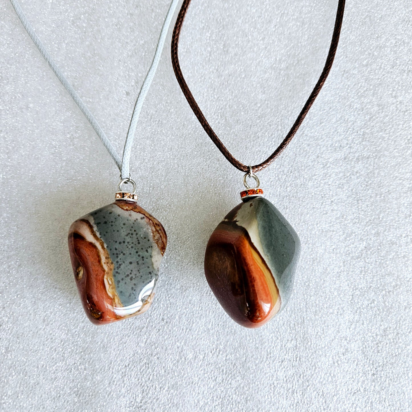 BEAUTIFUL POLYCHROME JASPER PENDANT WITH A STUNNING ARRAY OF COLOR PATTERNS.