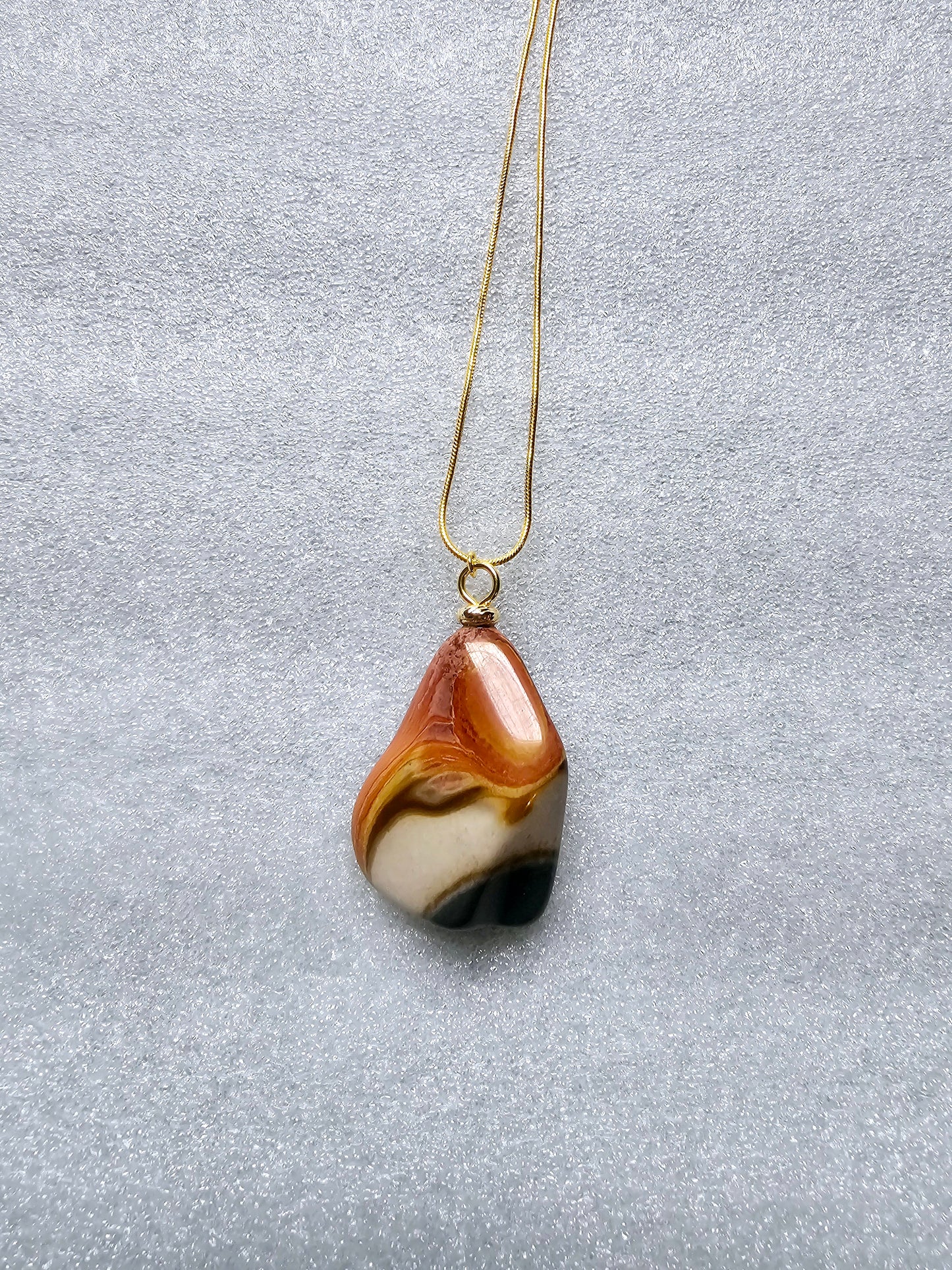 A STUNNING DESERT JASPER PENDANT