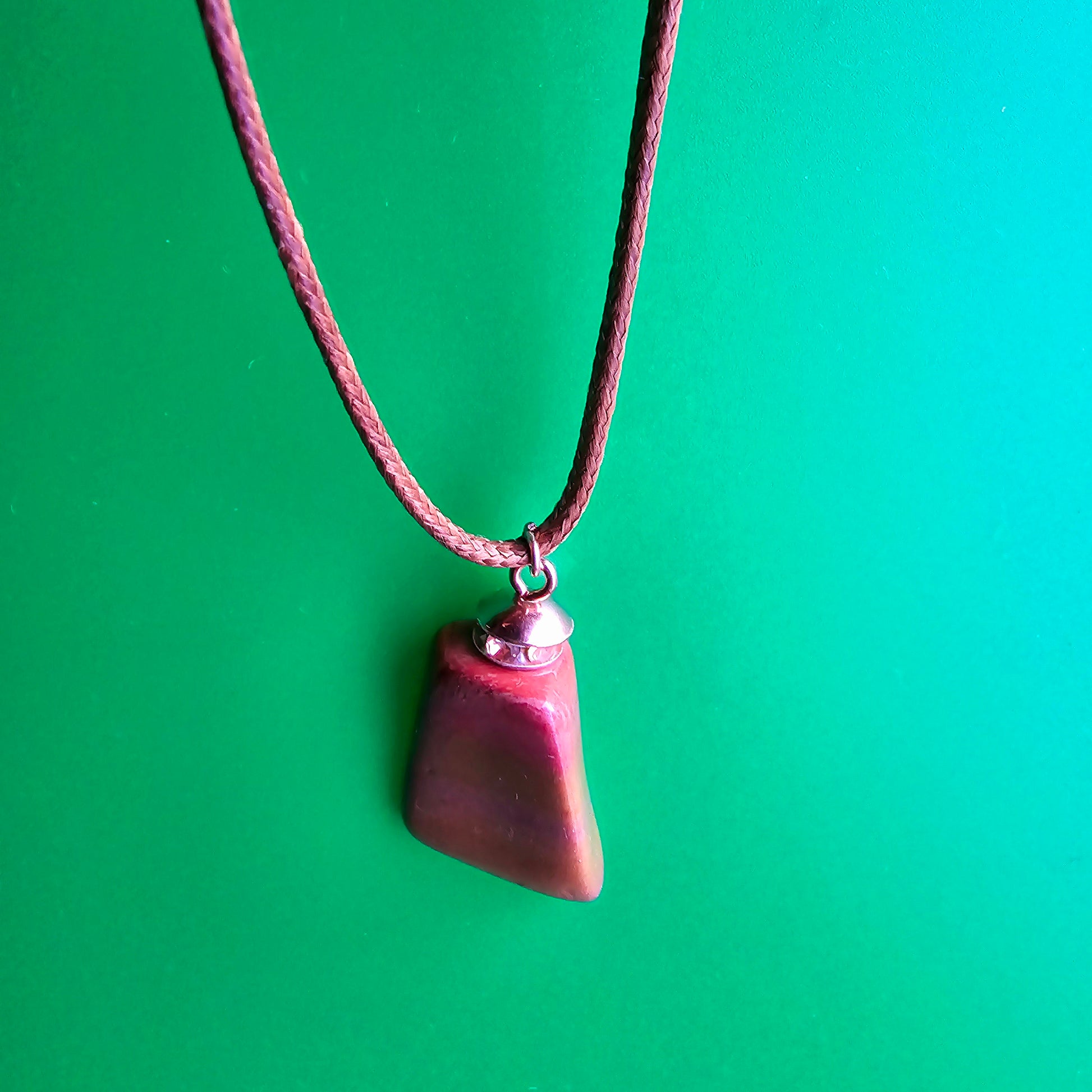 Very vibrant and colorful Jasper pendant that's trimmed with copper findings and an 18" Polyester string.