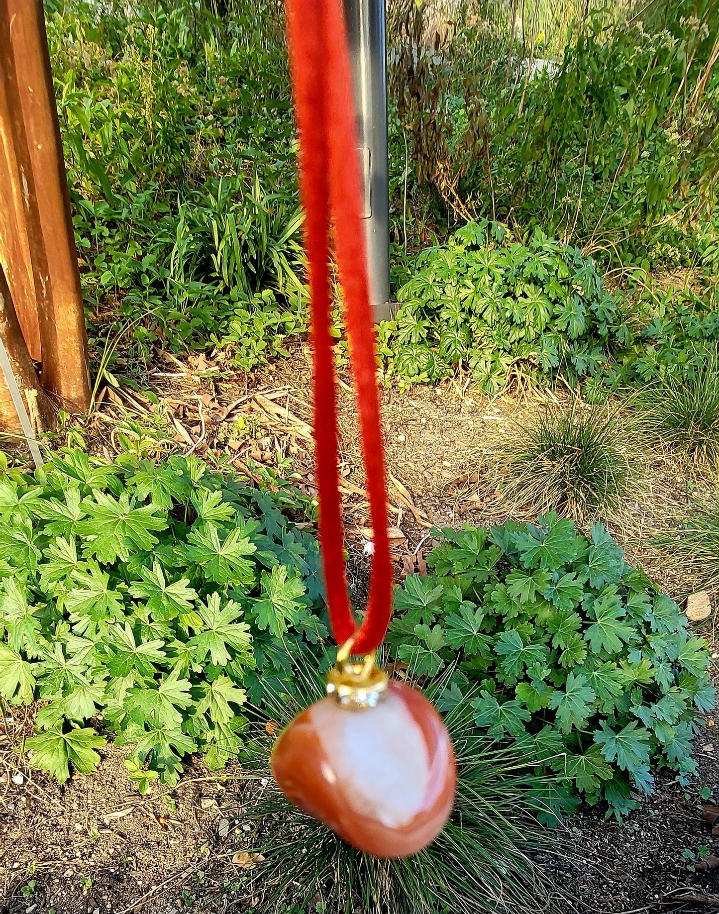 Orange and white Carnelian agate with an interesting color pattern. Intriguing appearance and shape.