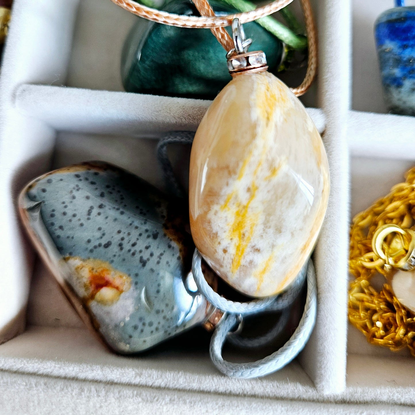 AMAZING DESERT JASPER PENDANT with extremely intricate color patterns and details! This is a very intricate and mesmerizing piece, featuring amazing color patterns and design. The shape is also super unique and will definitely stand out in the crowd!