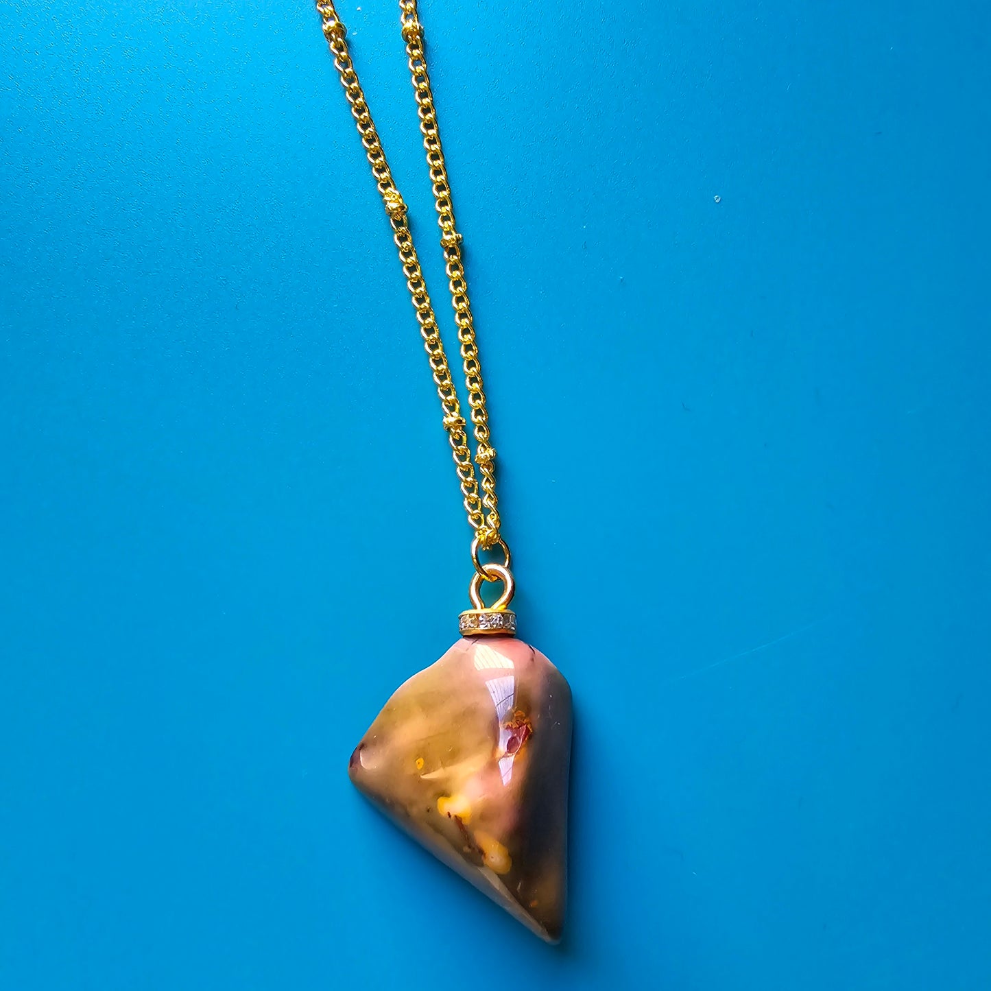 Beautiful Desert Jasper Pendant, trimmed with gold-plated findings and unique gold-plated 20" chain.