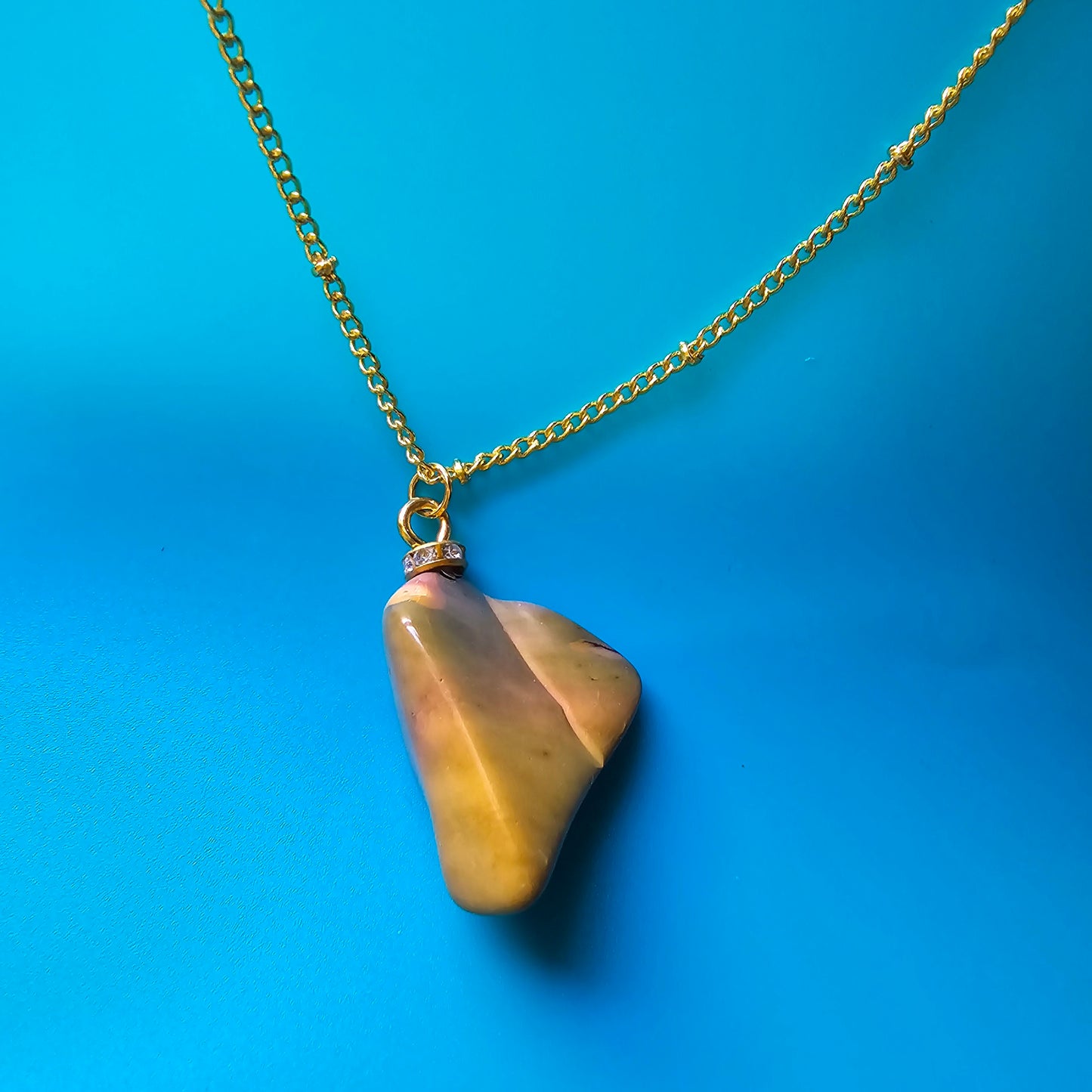 Beautiful Desert Jasper Pendant, trimmed with gold-plated findings and unique gold-plated 20" chain.