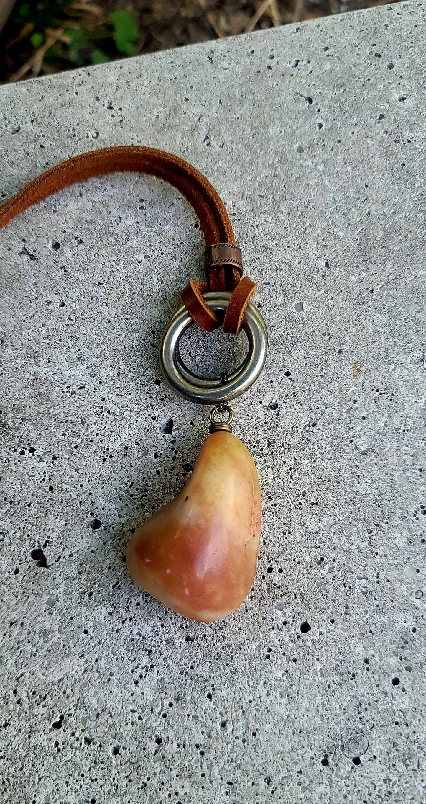 THIS BRASH AND BOLD AVENTURINE PENDANT IS LARGER THAN LIFE.