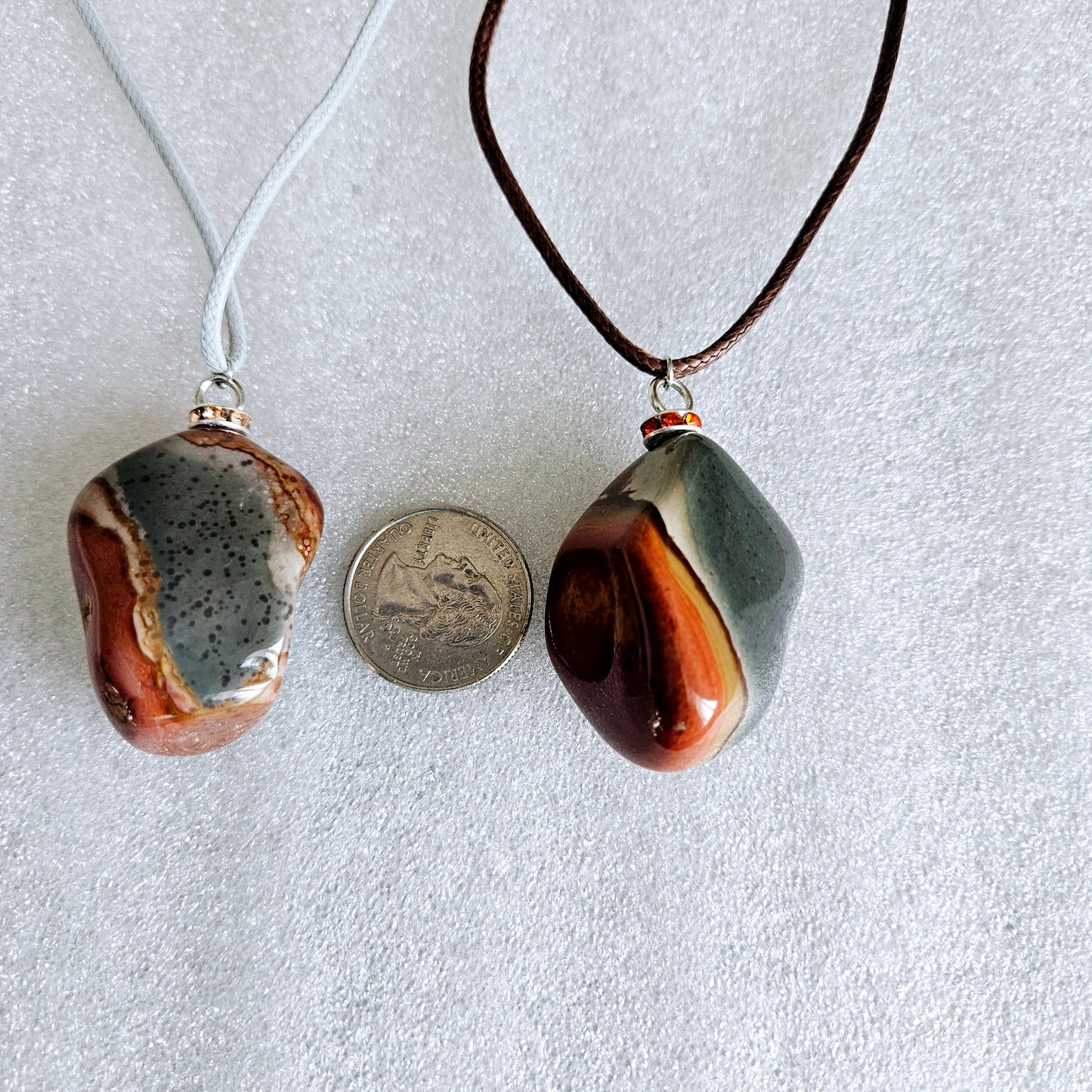 BEAUTIFUL POLYCHROME JASPER PENDANT WITH A STUNNING ARRAY OF COLOR PATTERNS.