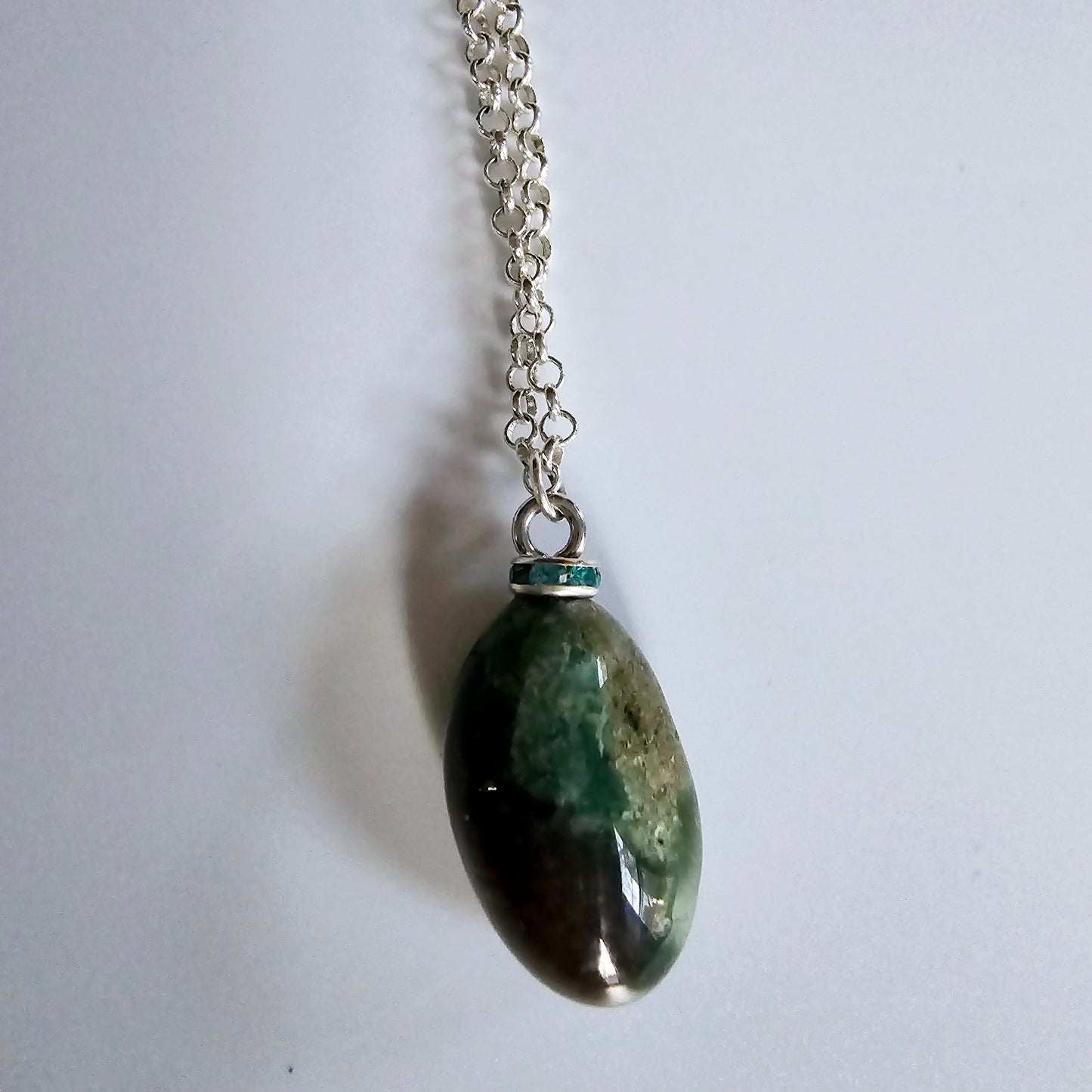 Beautiful, multicolored green Jasper Pendant. This pendant has very unique color patterns which makes it one of a kind.