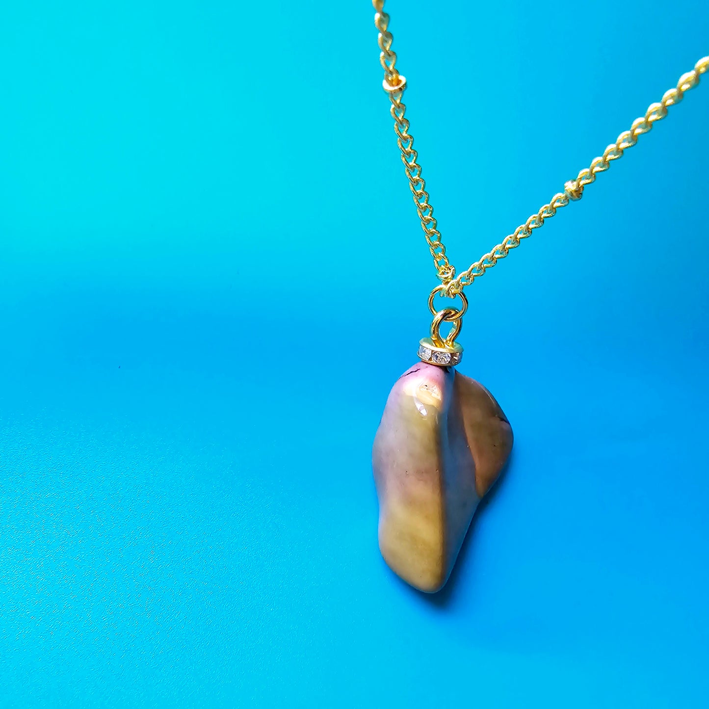 Beautiful Desert Jasper Pendant, trimmed with gold-plated findings and unique gold-plated 20" chain.