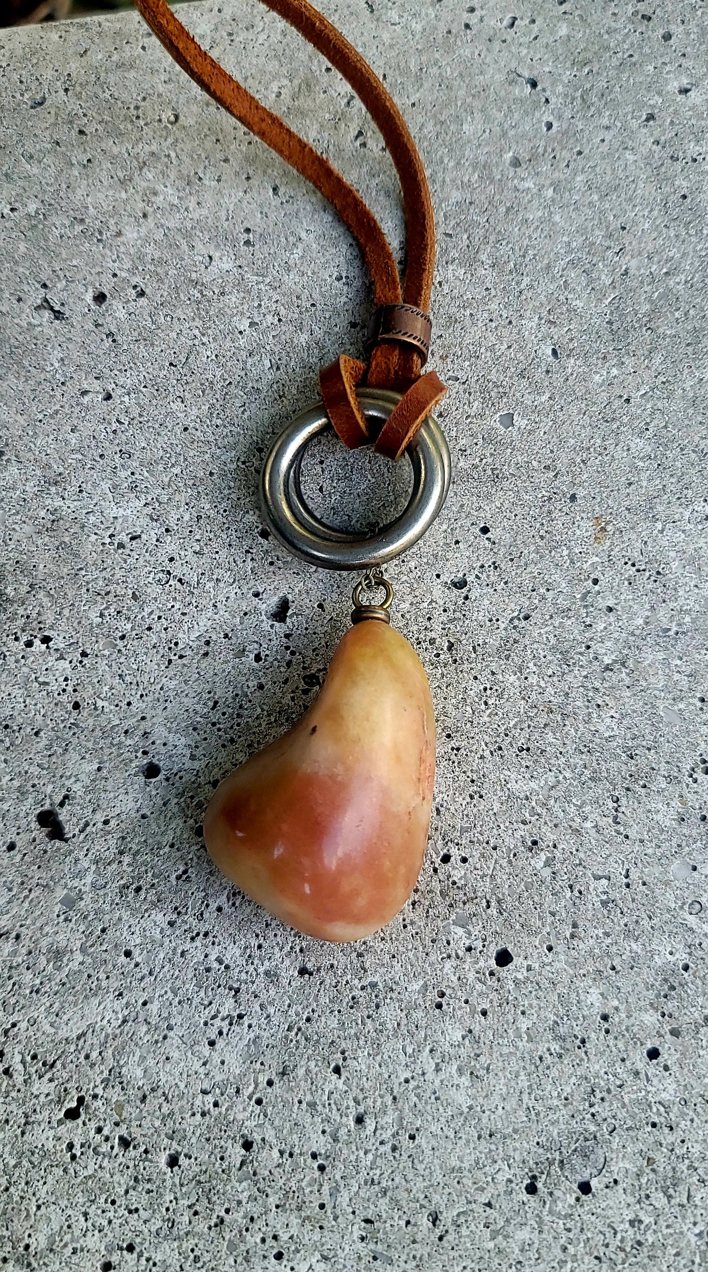 THIS BRASH AND BOLD AVENTURINE PENDANT IS LARGER THAN LIFE.