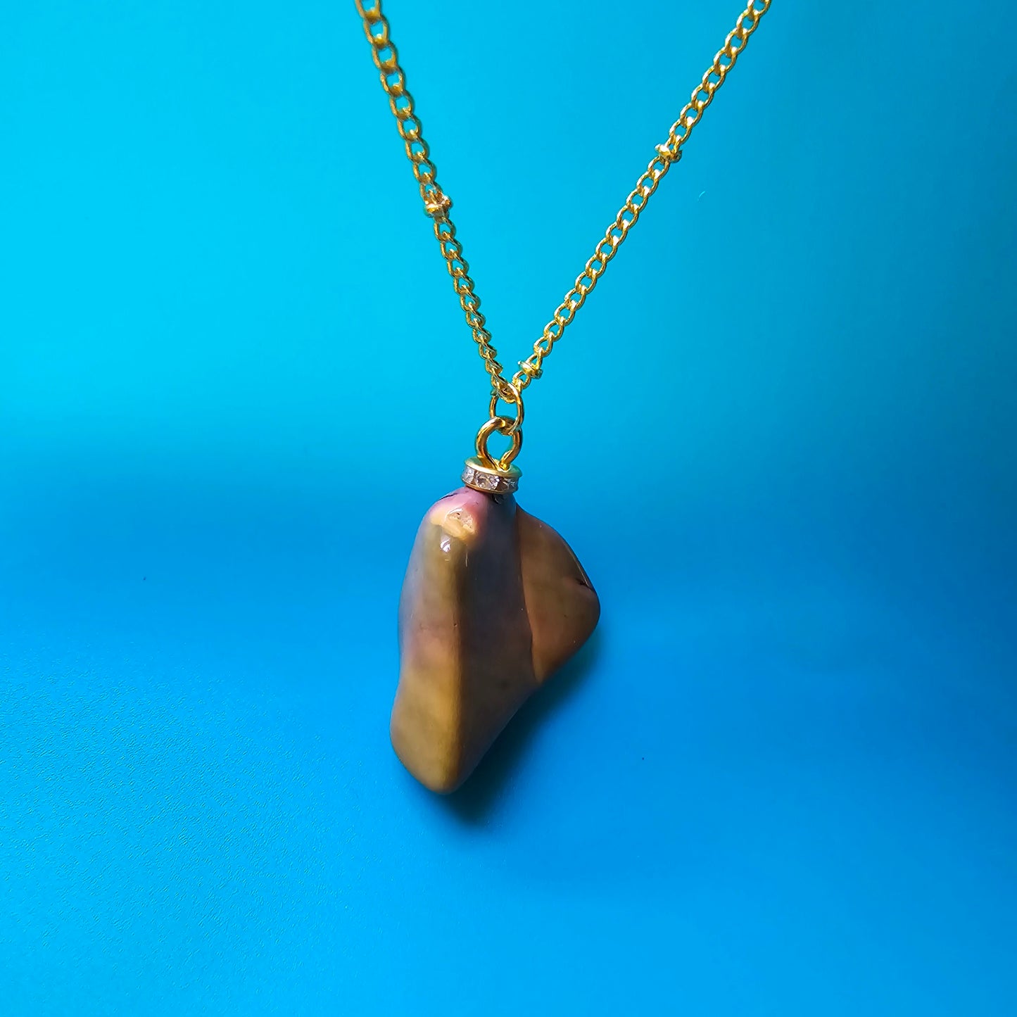 Beautiful Desert Jasper Pendant, trimmed with gold-plated findings and unique gold-plated 20" chain.