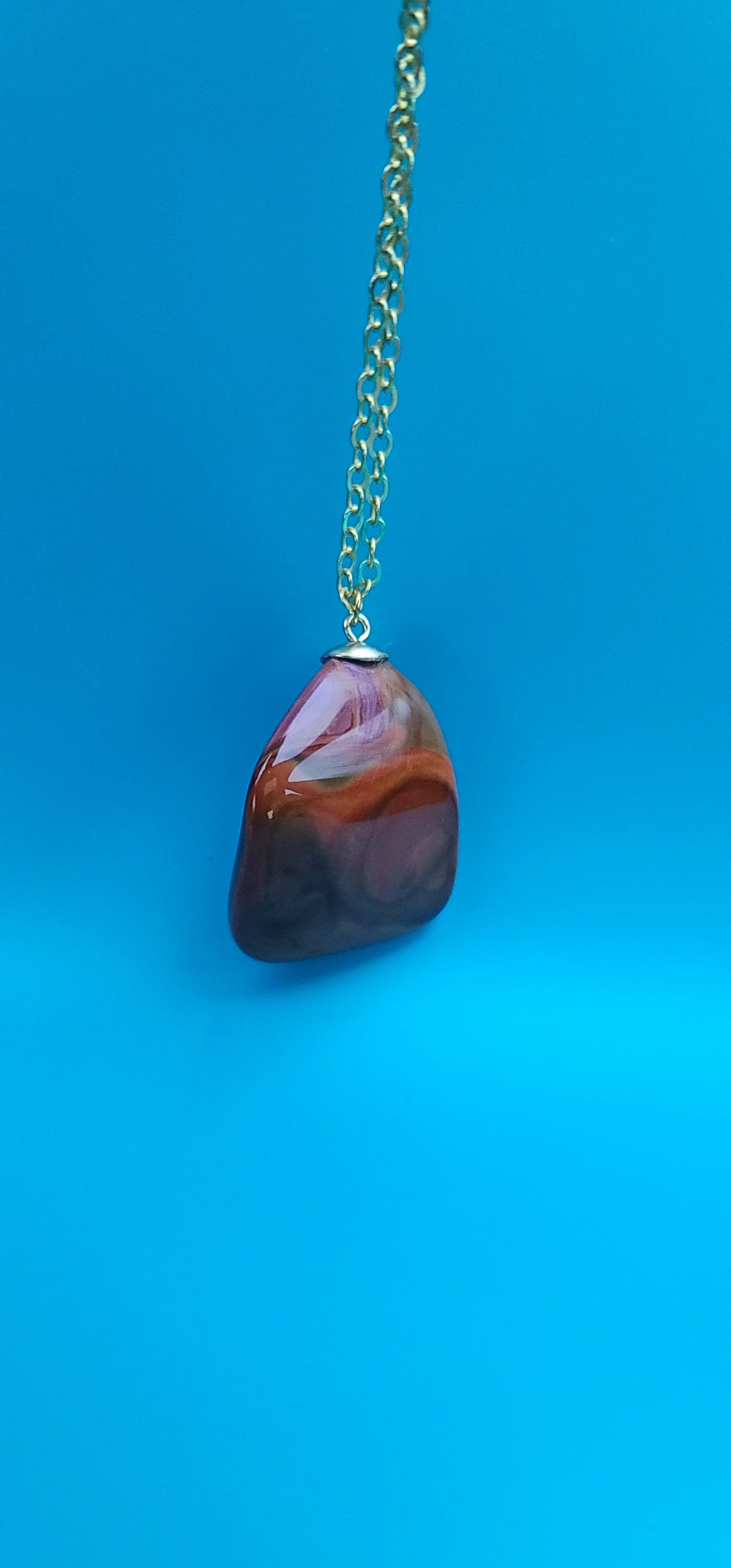 POLYCHROME JASPER PENDANT WITH A UNIQUE SHAPE AND INTRICATE COLOR PATTERN