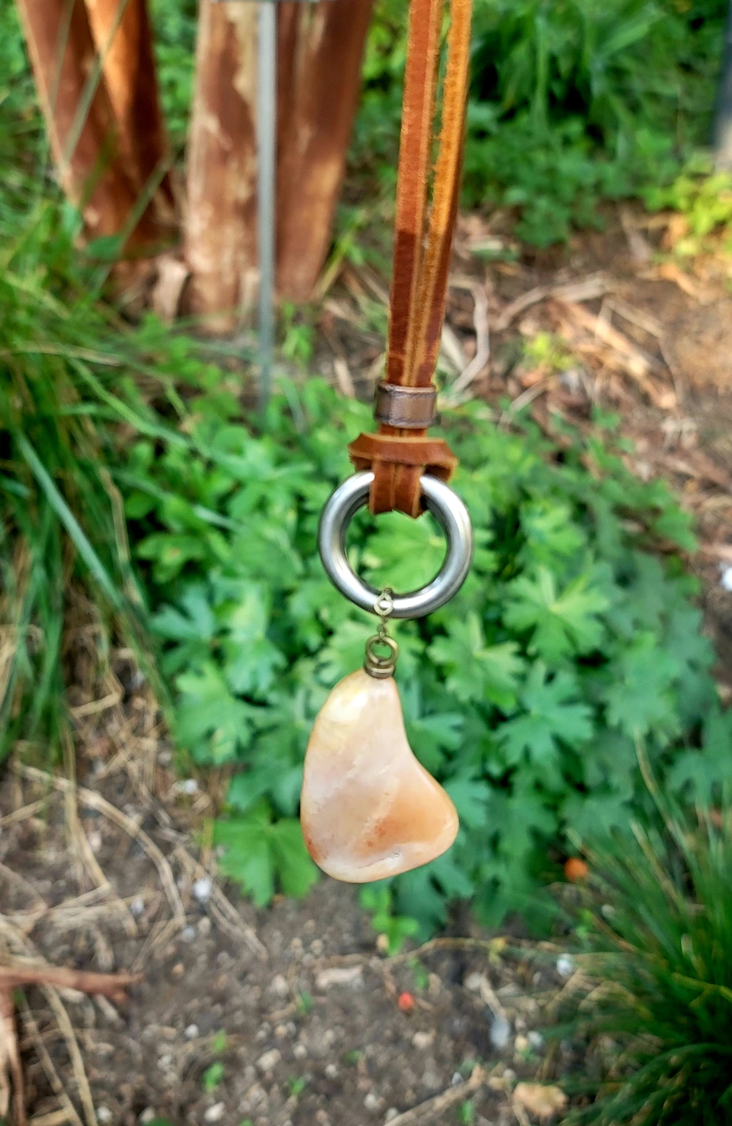 THIS BRASH AND BOLD AVENTURINE PENDANT IS LARGER THAN LIFE.