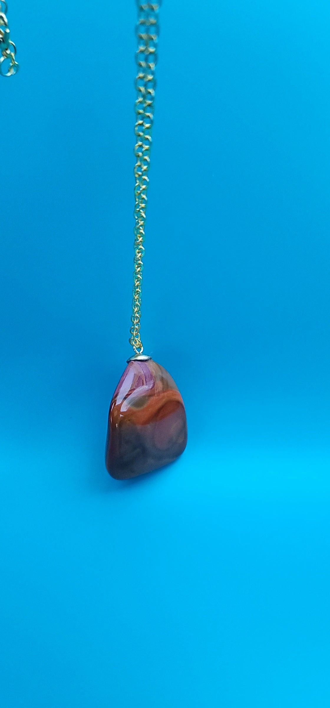 POLYCHROME JASPER PENDANT WITH A UNIQUE SHAPE AND INTRICATE COLOR PATTERN