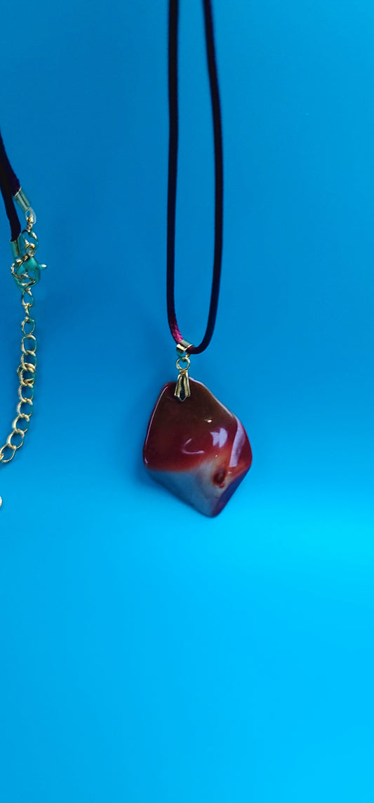 AN EXQUISITE DESERT JASPER PENDANT that is super unique in shape and color. Be amazed by the Uniqueness of this Pendant. You are sure to be the center of the conversation with this piece!!