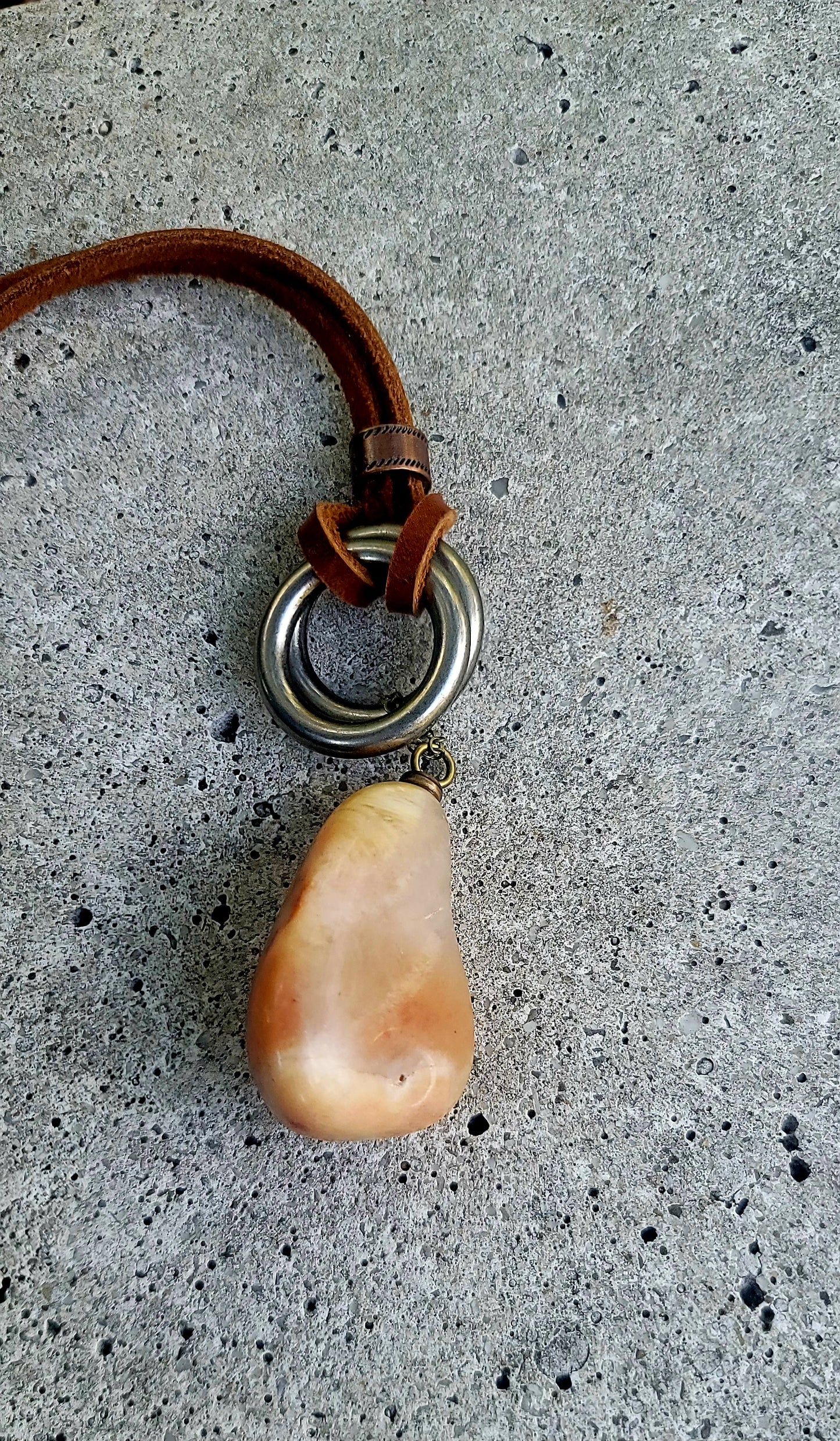 THIS BRASH AND BOLD AVENTURINE PENDANT IS LARGER THAN LIFE.