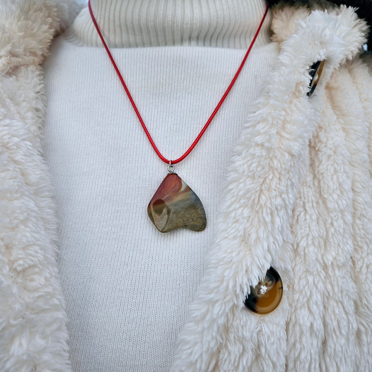 A Desert Jasper Pendant with an intricate color pattern that is sure to entice you! This is such a unique and interesting Pendant that it is sure to entice you! Explore its details and features and enjoy!!