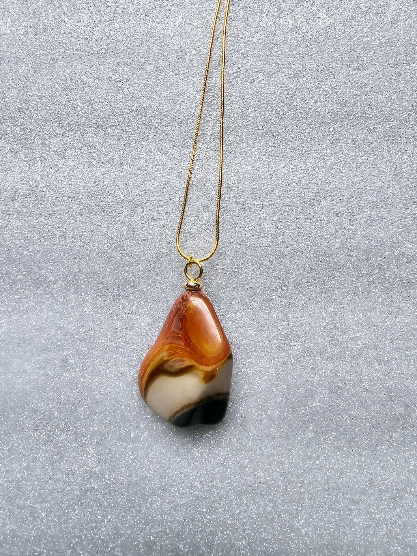 A STUNNING DESERT JASPER PENDANT