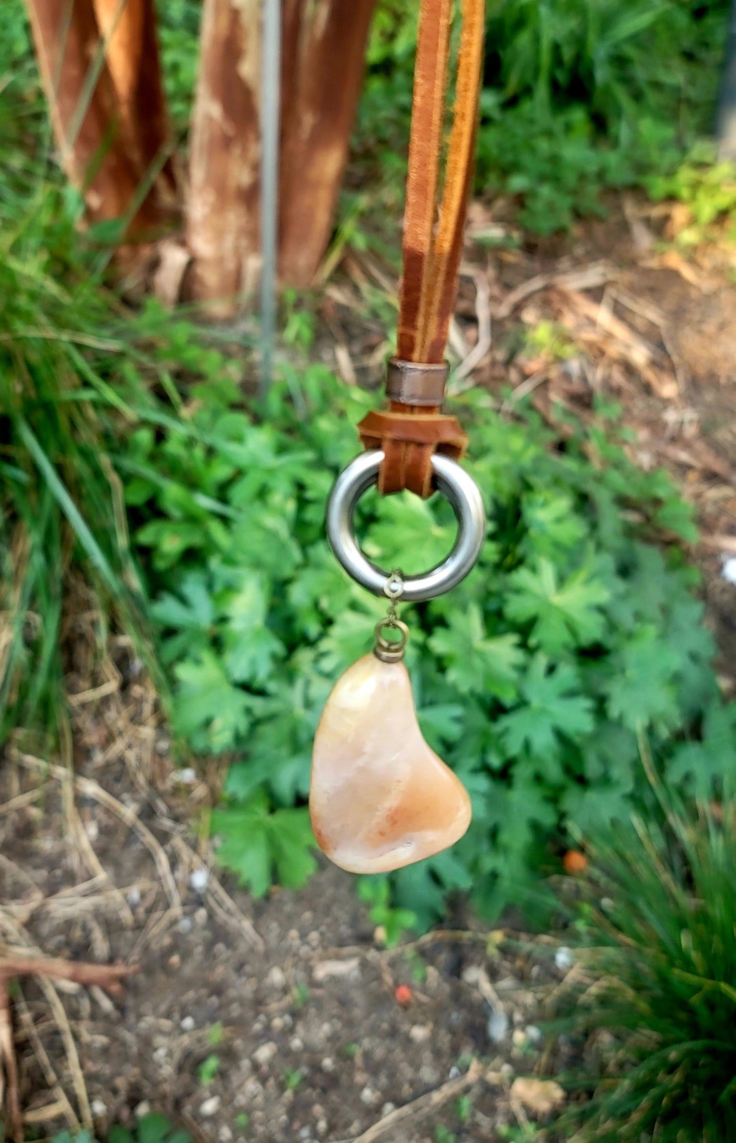 THIS BRASH AND BOLD AVENTURINE PENDANT IS LARGER THAN LIFE.