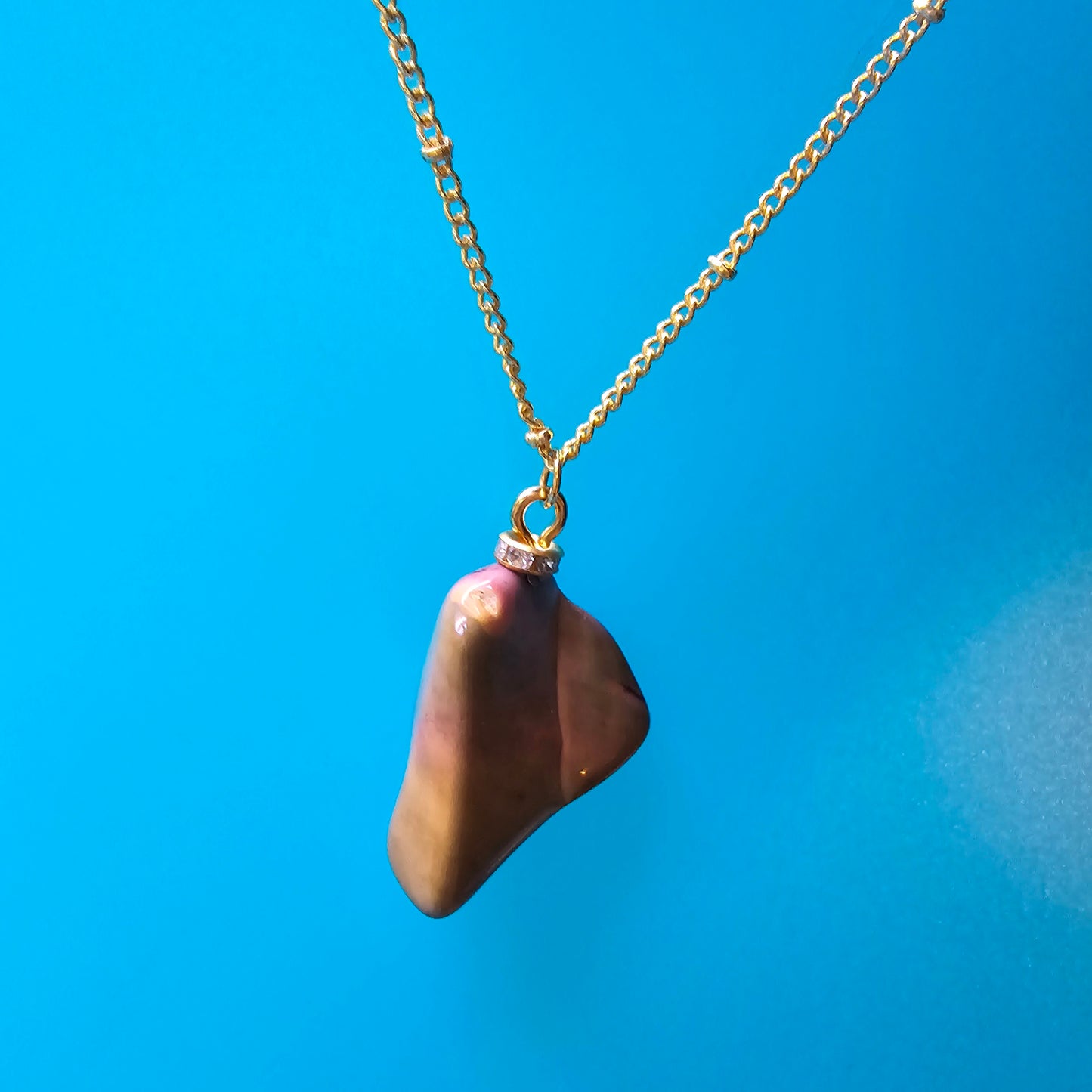 Beautiful Desert Jasper Pendant, trimmed with gold-plated findings and unique gold-plated 20" chain.