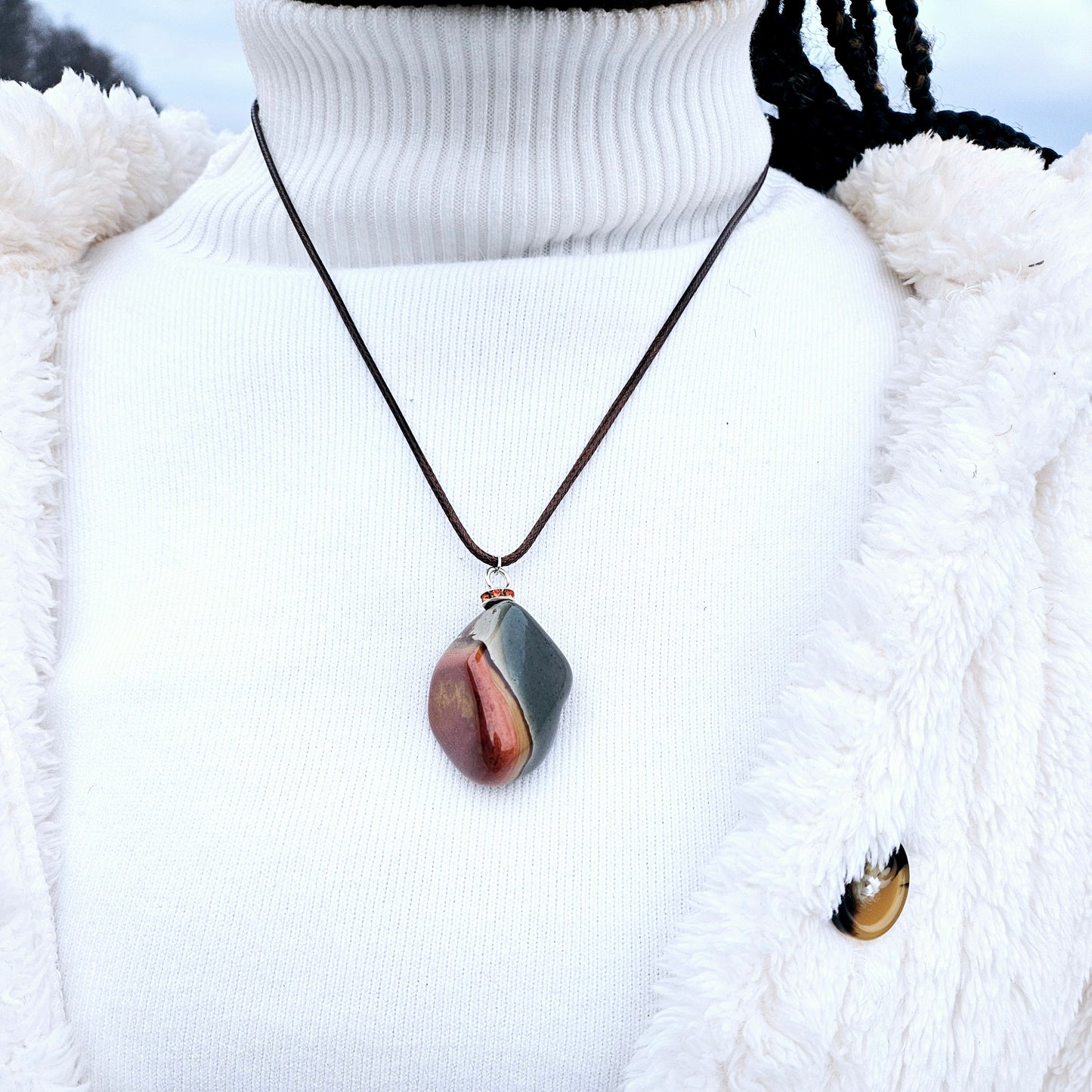 BEAUTIFUL POLYCHROME JASPER PENDANT WITH A STUNNING ARRAY OF COLOR PATTERNS.