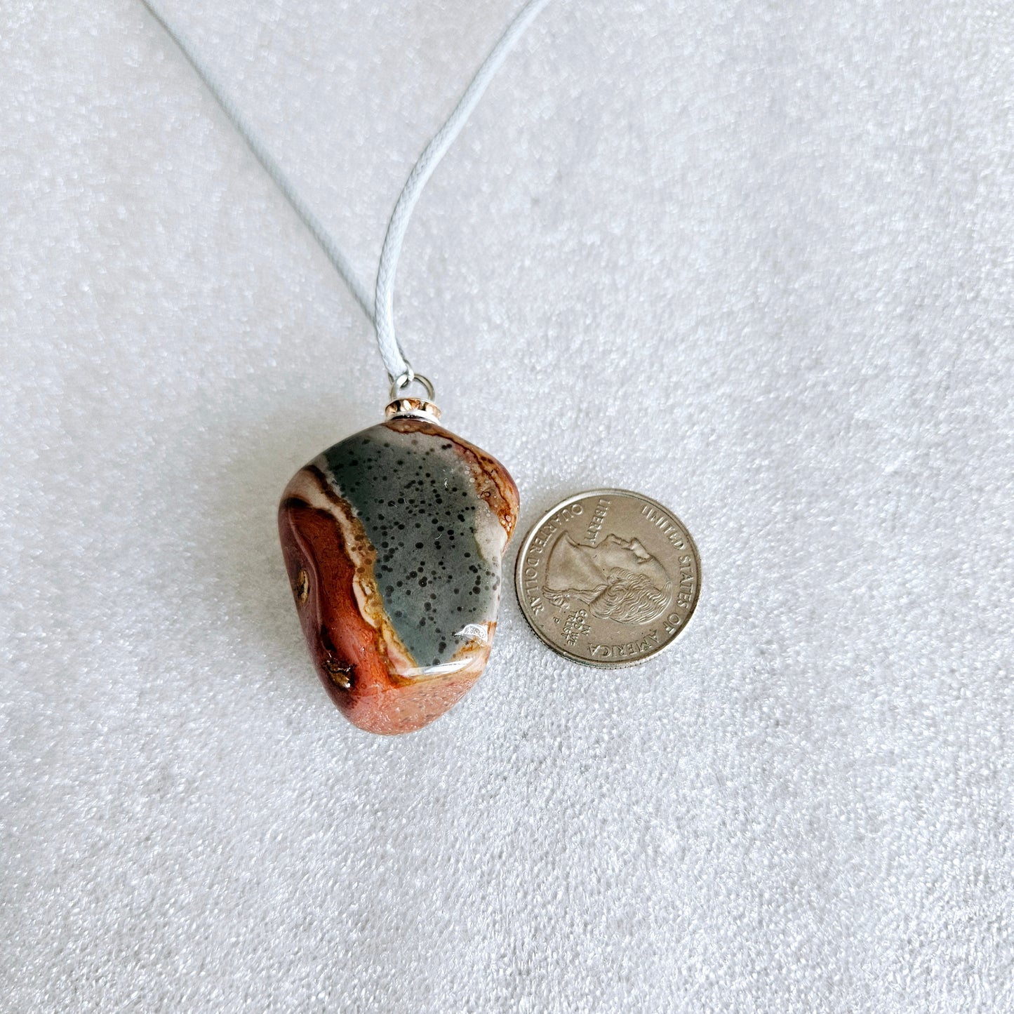 AMAZING DESERT JASPER PENDANT with extremely intricate color patterns and details! This is a very intricate and mesmerizing piece, featuring amazing color patterns and design. The shape is also super unique and will definitely stand out in the crowd!